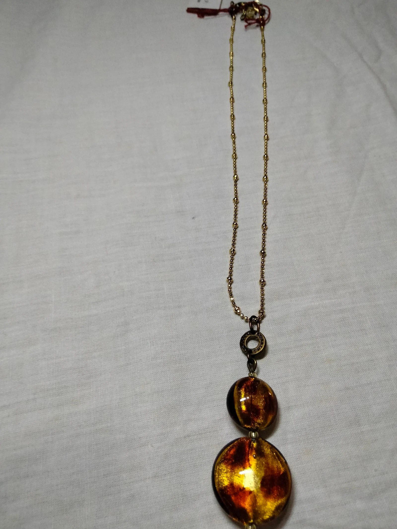 Colgante murano y rodio dorado.